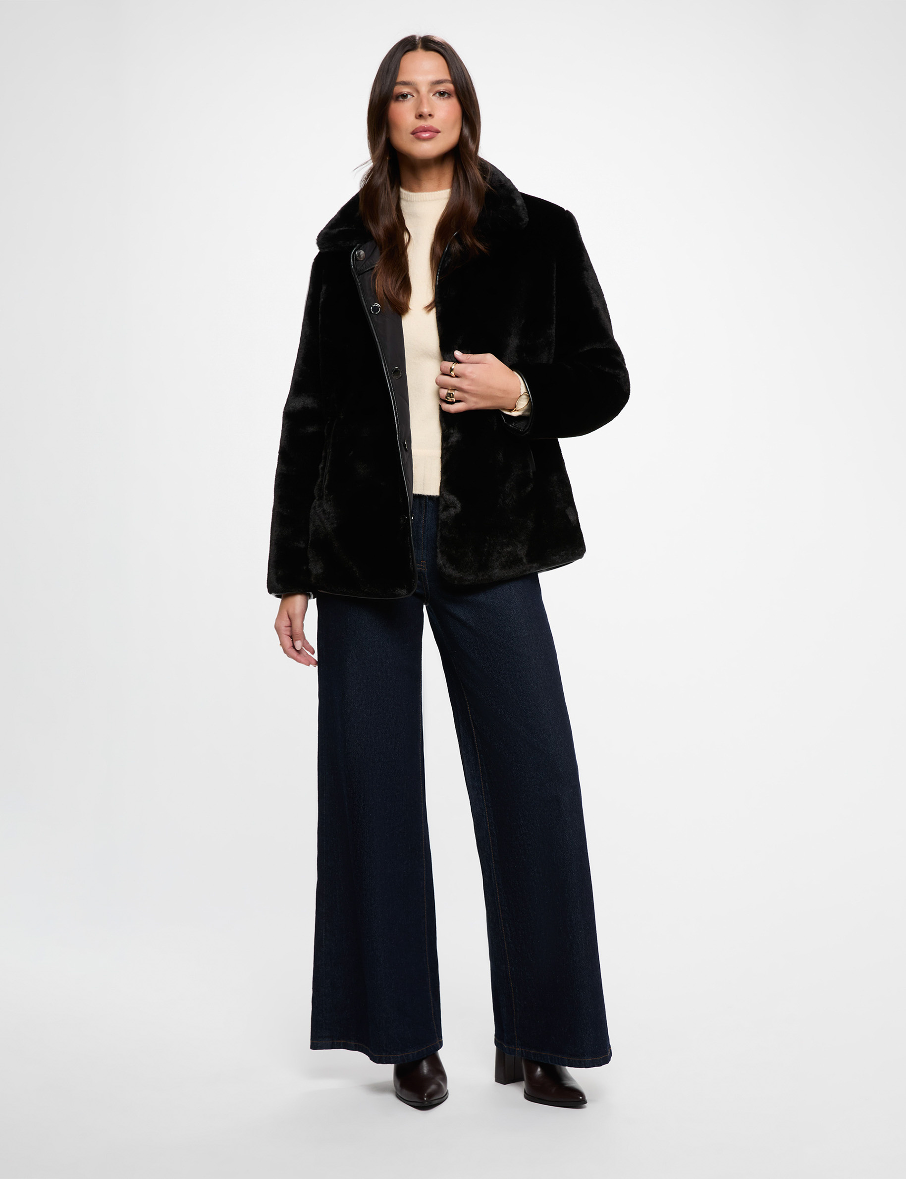 Plum&iacute;fero reversible negro mujer