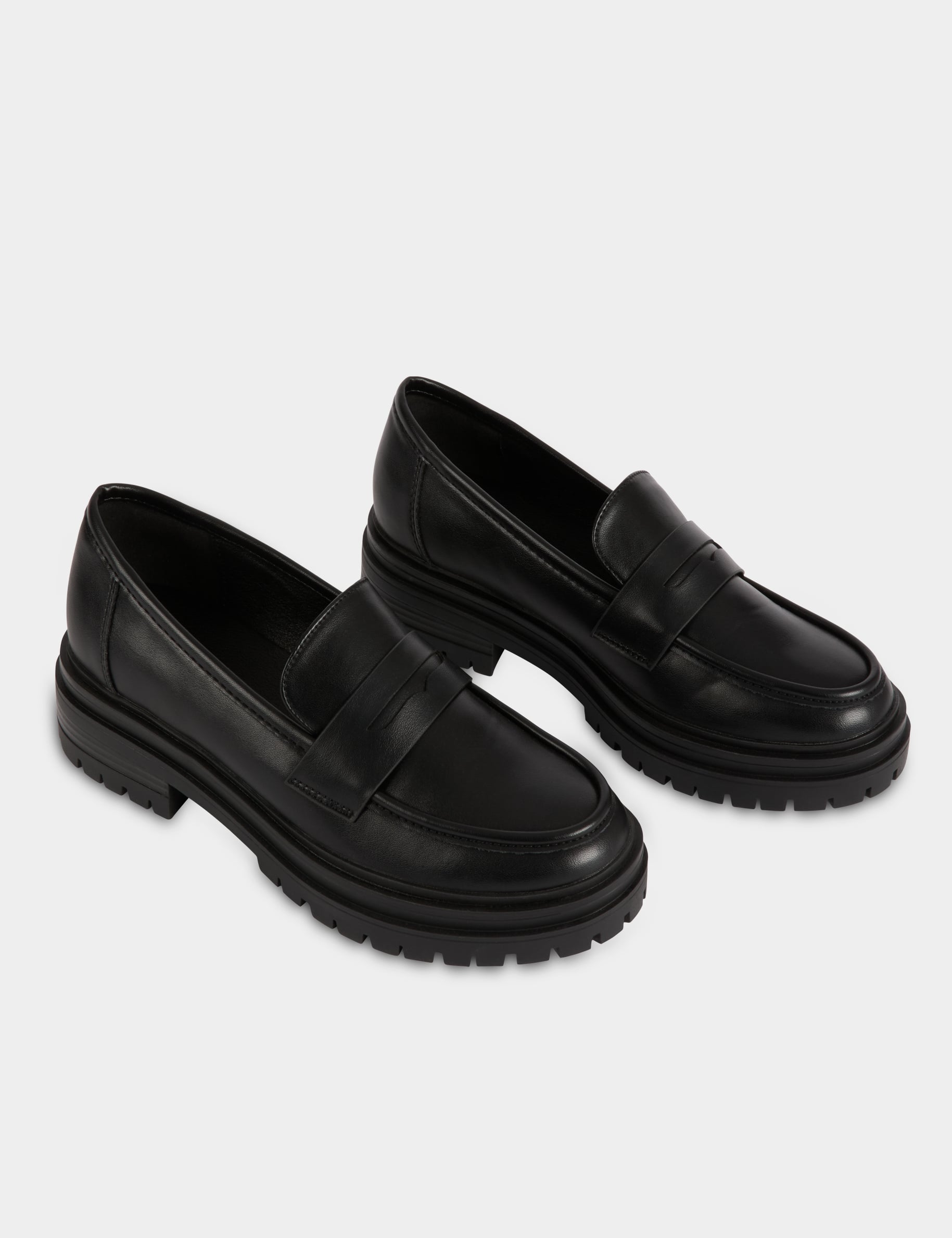 Mocasines con suela dentada negro mujer