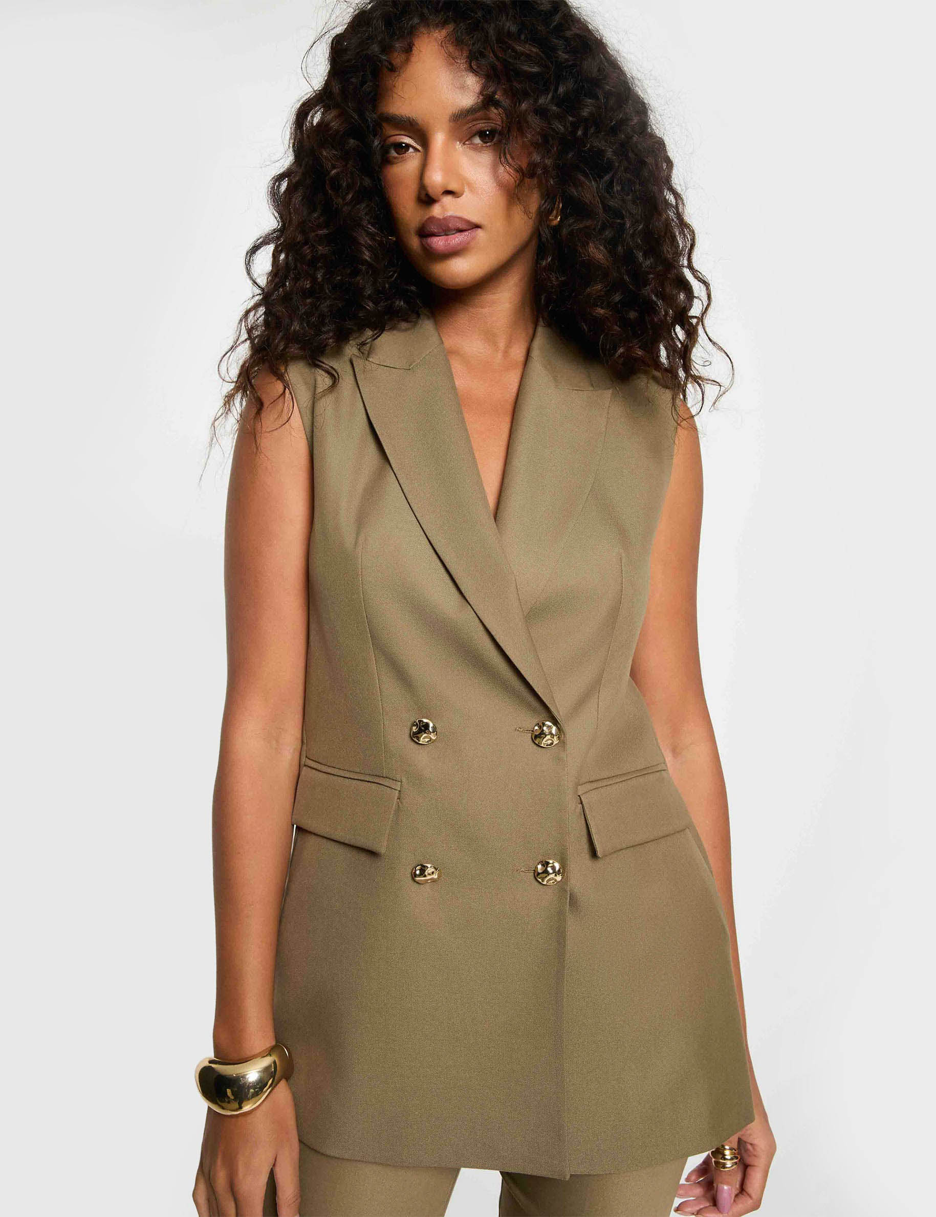 Chaqueta sin mangas verde caqui mujer
