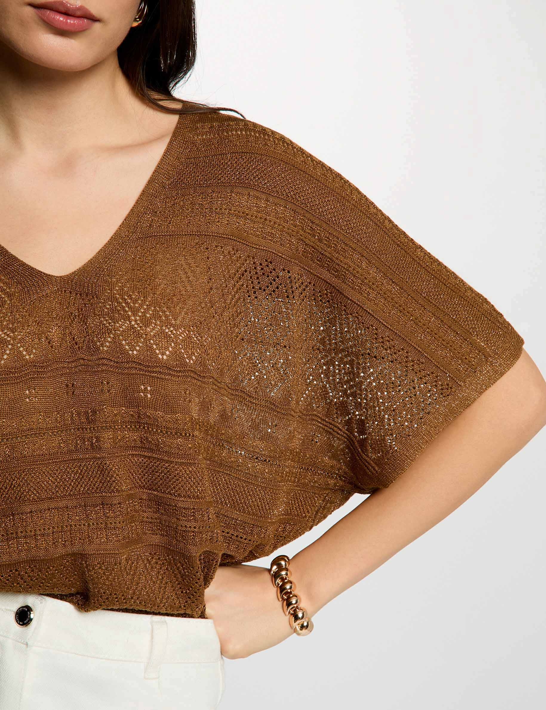 Jersey oversize con cuello en V c&aacute;mel mujer