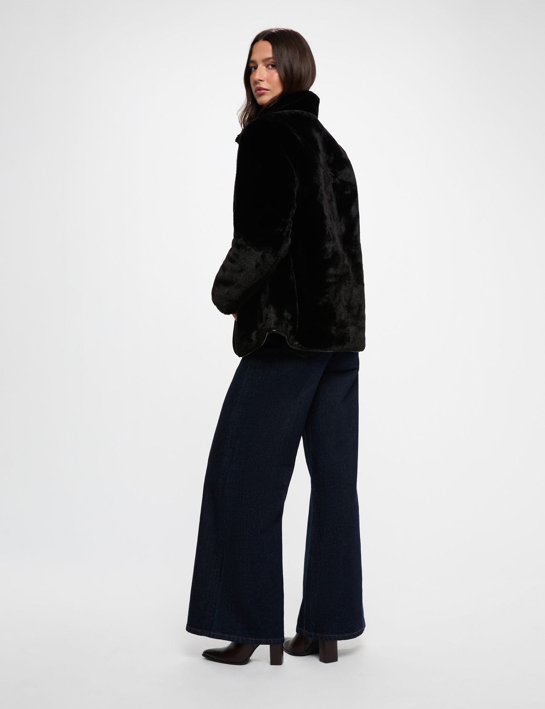 Plum&iacute;fero reversible negro mujer
