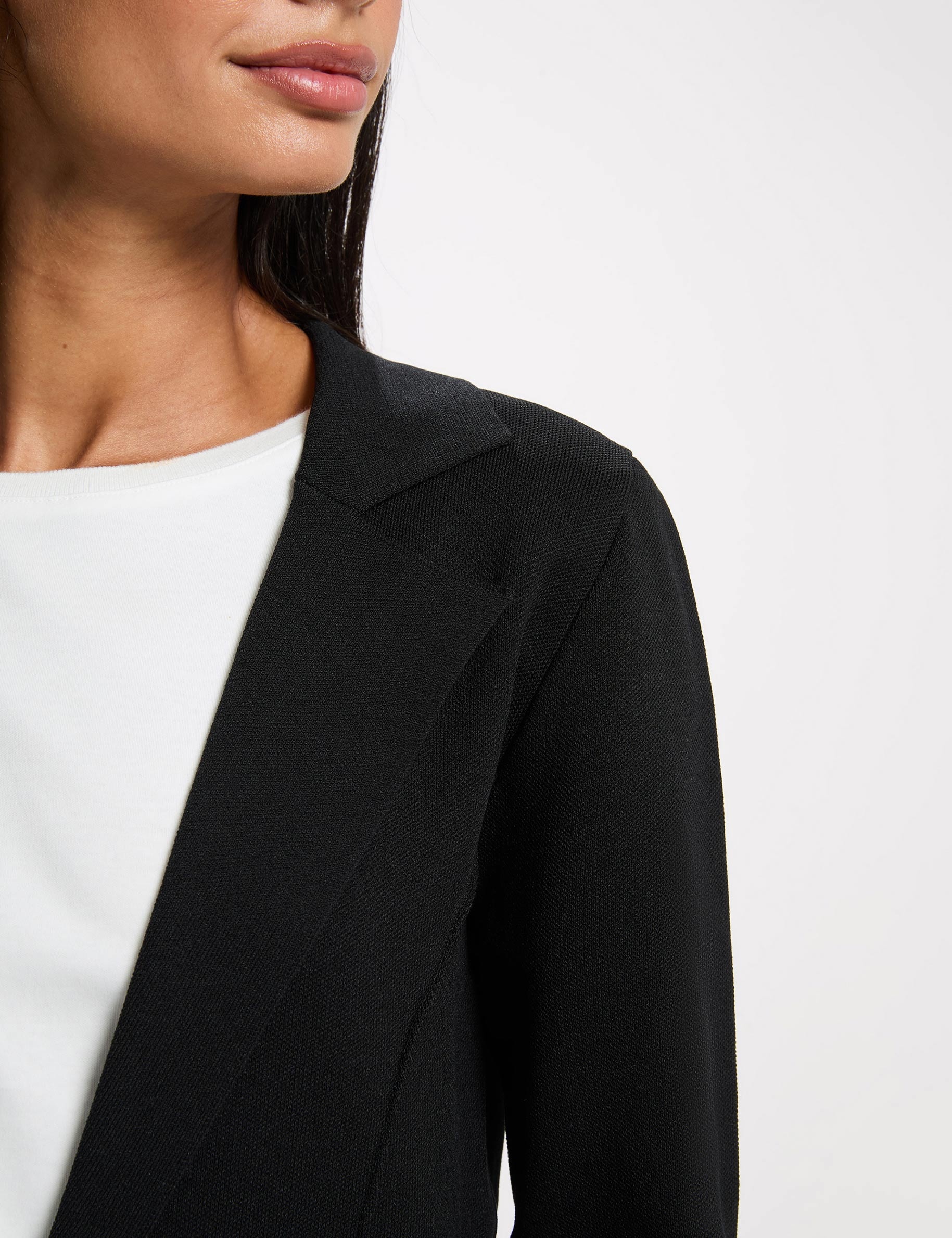 Chaqueta entallada con solapa negro mujer