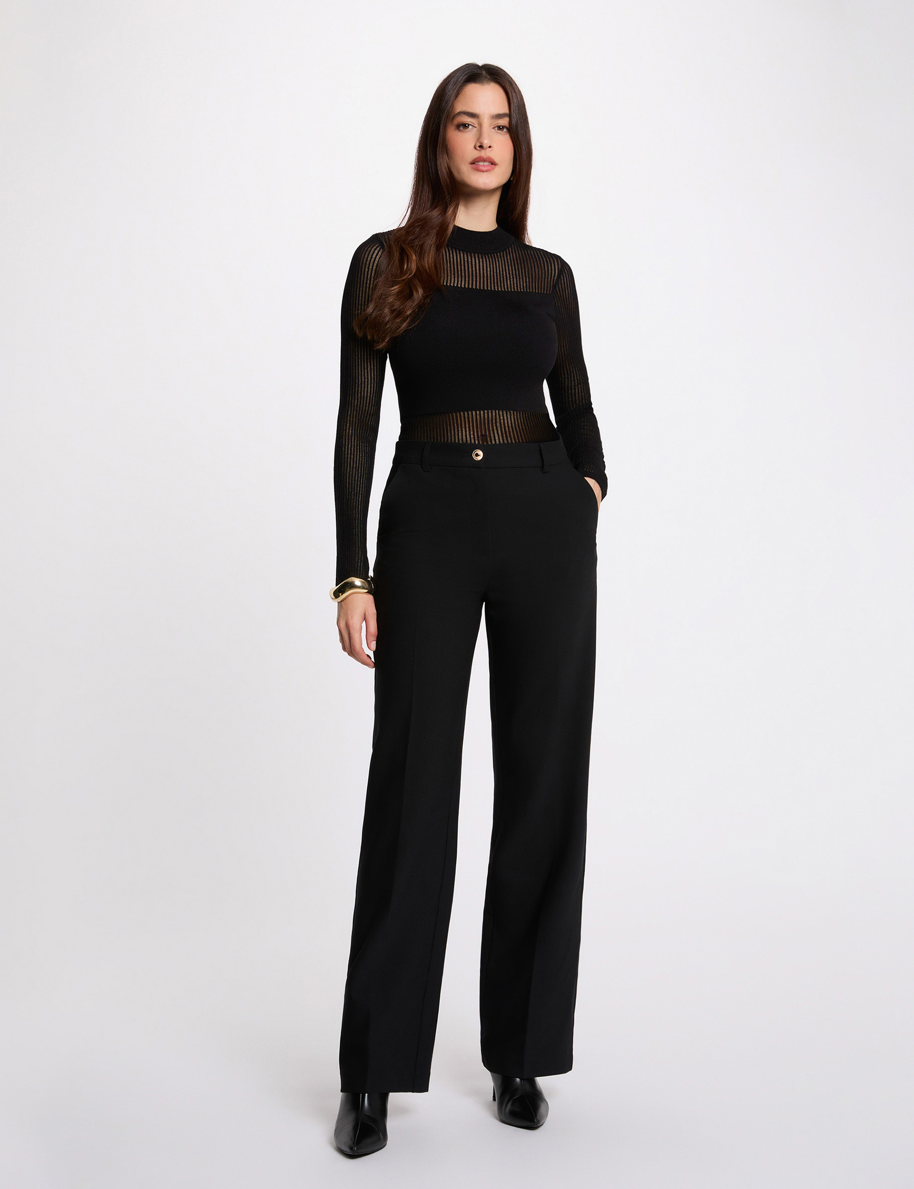 Jersey calado de cuello alto negro mujer
