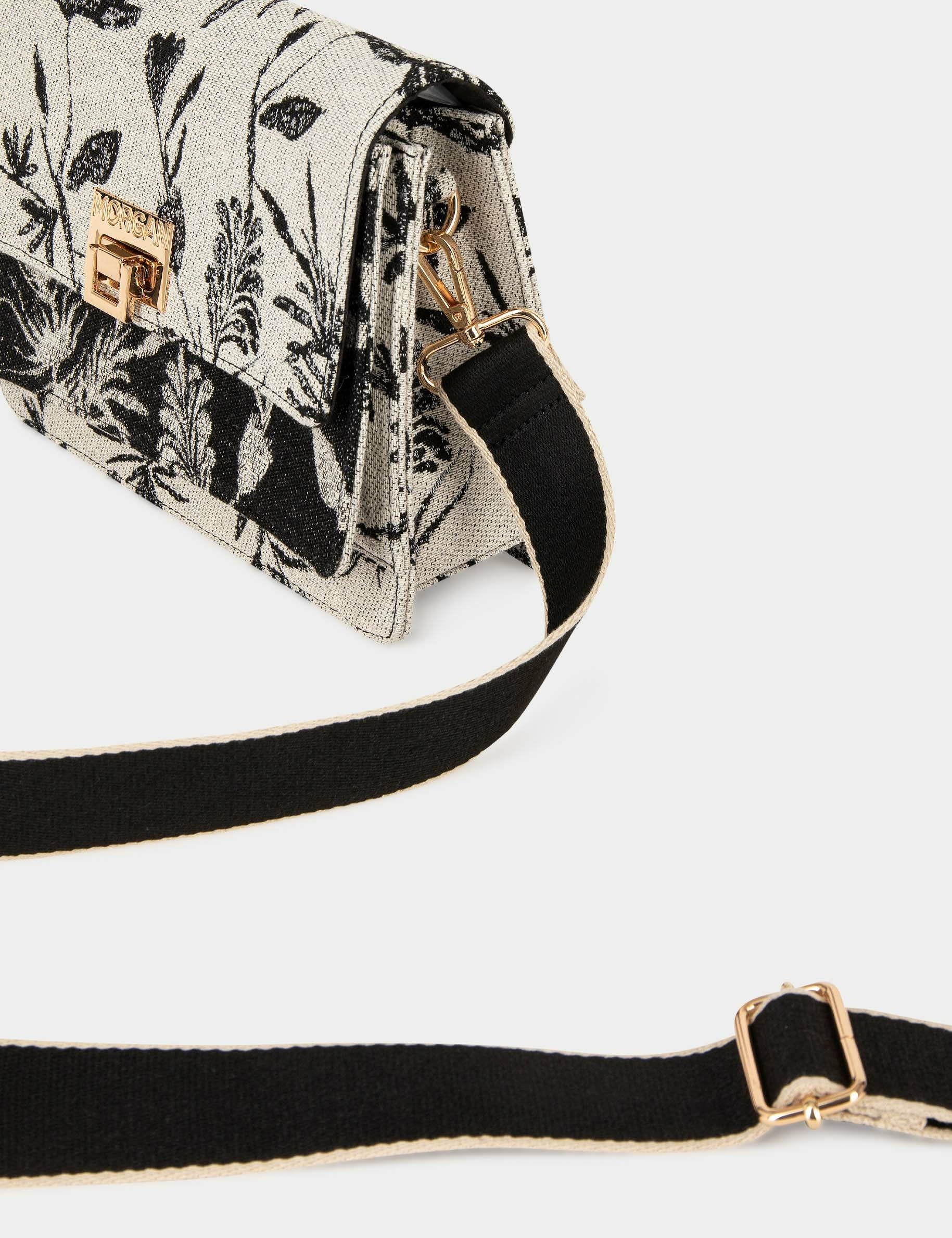 bolso con solapa estampado vegetal negro mujer Bolso con solapa estampado vegetal negro mujer
