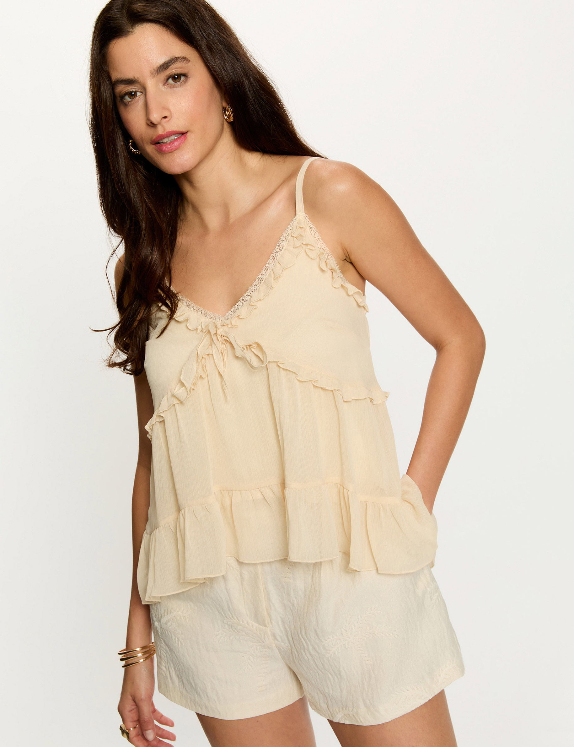 Top ajustado con detalles creme mujer