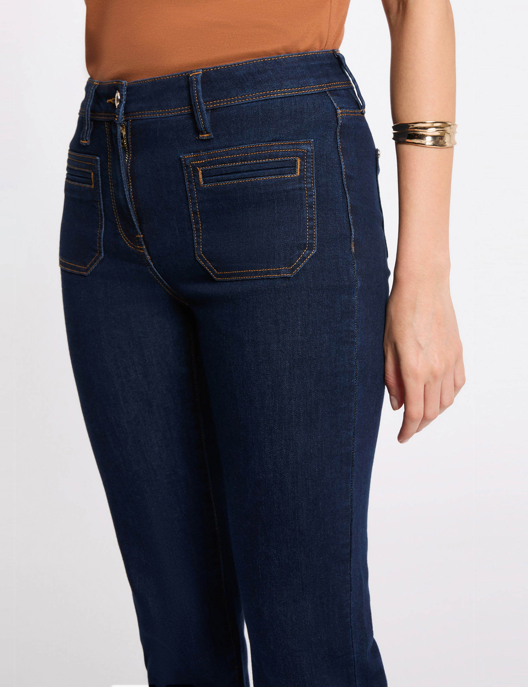 Vaqueros bootcut de tiro alto denim crudo mujer