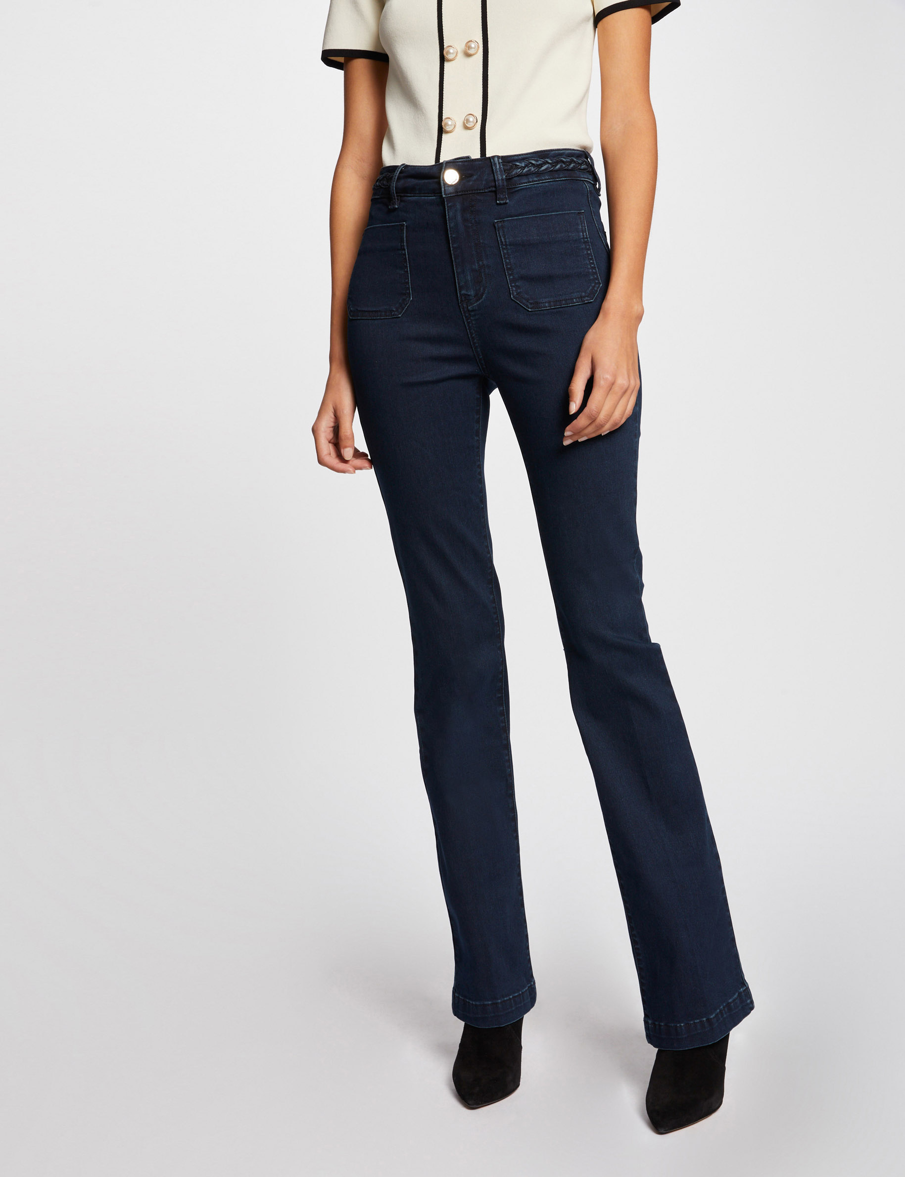 Vaquero boot-cut con detalles trenzados vaquero en bruto mujer