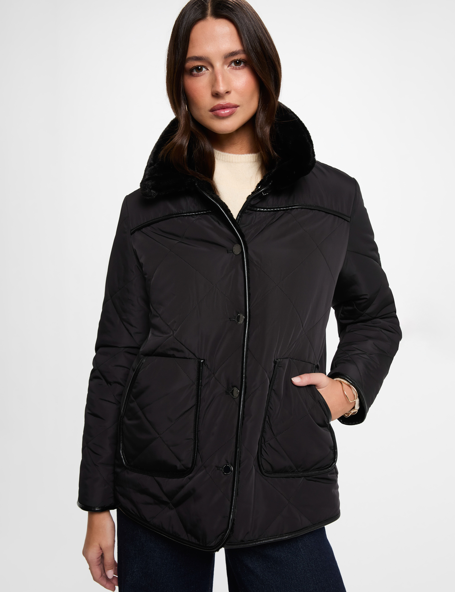 Plum&iacute;fero reversible negro mujer